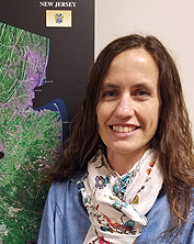 Picture of Inga in front of imagery