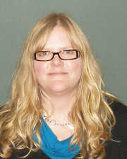 Picture of Brenda with gray backdrop