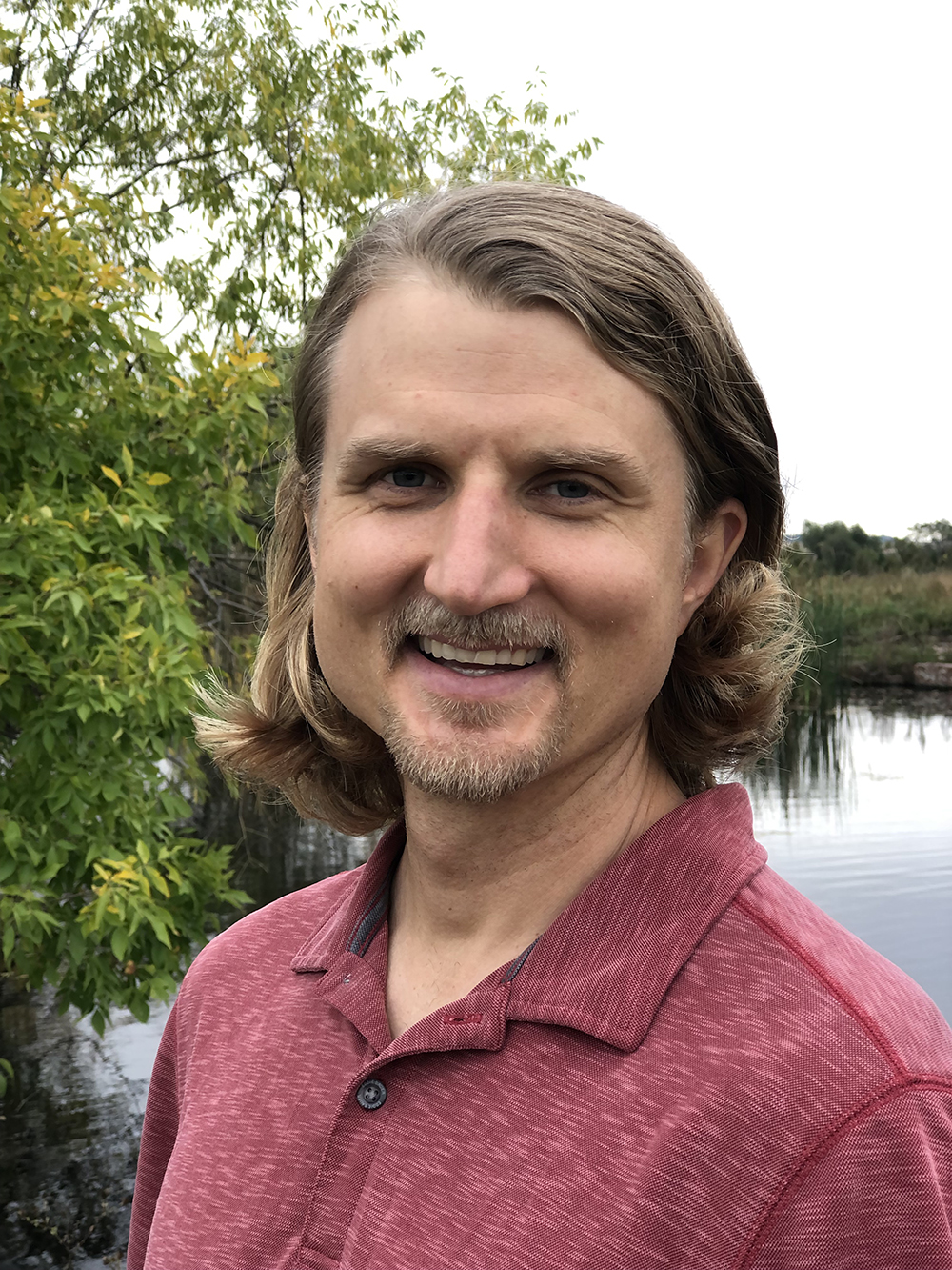 Picture of Daryn by a lake